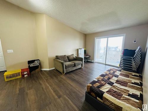 412 245 Edwards Dr, Edmonton, AB - Indoor Photo Showing Living Room