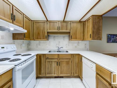 10860 11 Avenue, Edmonton, AB - Indoor Photo Showing Kitchen With Double Sink