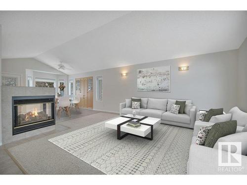 240 49547 Rge Road 243, Rural Leduc County, AB - Indoor Photo Showing Living Room With Fireplace