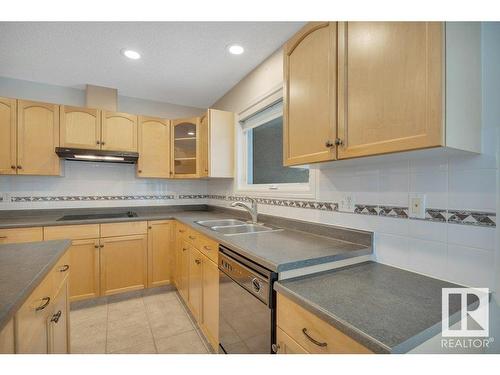 240 49547 Rge Road 243, Rural Leduc County, AB - Indoor Photo Showing Kitchen With Double Sink