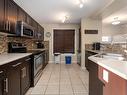 101 1804 70 Street, Edmonton, AB  - Indoor Photo Showing Kitchen With Stainless Steel Kitchen With Double Sink With Upgraded Kitchen 