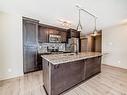 302 4008 Savaryn Drive, Edmonton, AB  - Indoor Photo Showing Kitchen With Upgraded Kitchen 