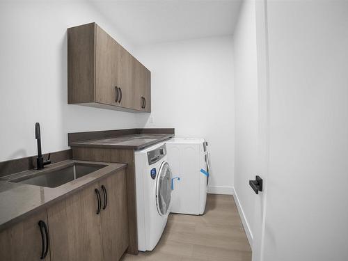 145 Creekside Lane, Leduc, AB - Indoor Photo Showing Laundry Room