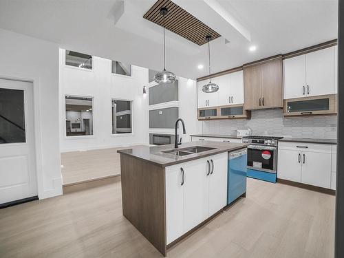 145 Creekside Lane, Leduc, AB - Indoor Photo Showing Kitchen With Double Sink