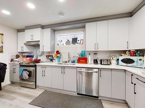 115 Lakeland Drive, Beaumont, AB - Indoor Photo Showing Kitchen With Double Sink