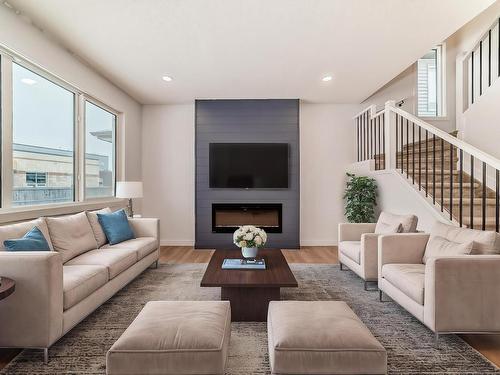 207 Kettyl Co Nw, Leduc, AB - Indoor Photo Showing Living Room With Fireplace