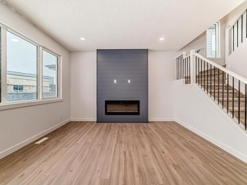 207 Kettyl Co Nw, Leduc, AB - Indoor With Fireplace