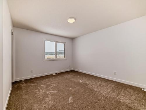 207 Kettyl Co Nw, Leduc, AB - Indoor Photo Showing Other Room