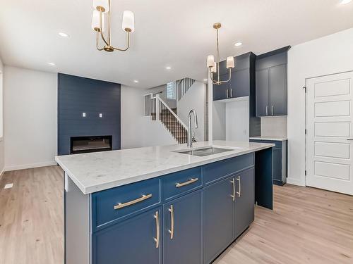 207 Kettyl Co Nw, Leduc, AB - Indoor Photo Showing Kitchen With Double Sink