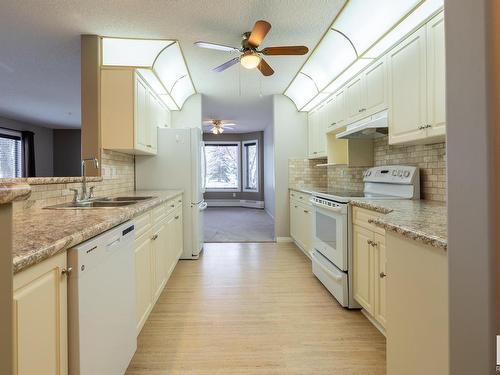 113 70 Crystal Lane, Sherwood Park, AB - Indoor Photo Showing Kitchen With Double Sink