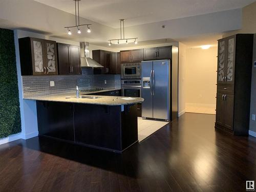 Edmonton, AB - Indoor Photo Showing Kitchen