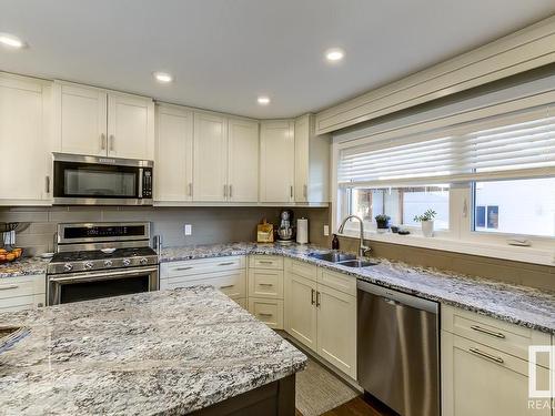 9739 148 Street, Edmonton, AB - Indoor Photo Showing Kitchen With Double Sink