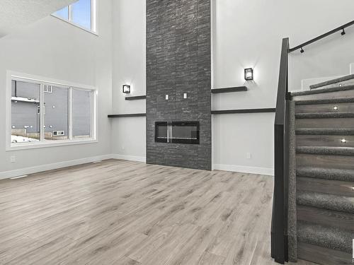 5909 19 St, Rural Leduc County, AB - Indoor Photo Showing Other Room With Fireplace