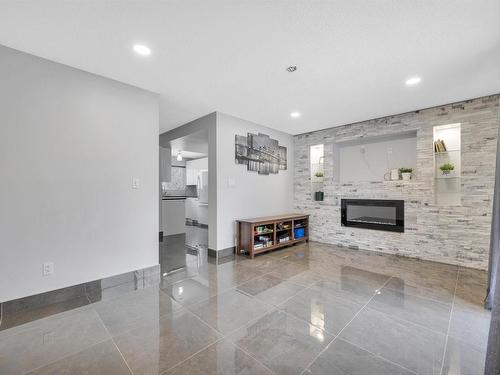 10634 Beaumaris Road, Edmonton, AB - Indoor Photo Showing Other Room With Fireplace