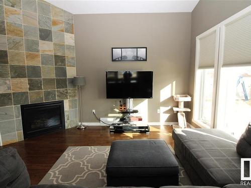 11015 103 Street, Westlock, AB - Indoor Photo Showing Living Room With Fireplace