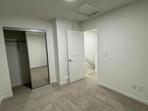 115 1025 Secord Promenade Nw, Edmonton, AB - Indoor Photo Showing Other Room