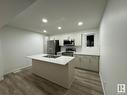 115 1025 Secord Promenade Nw, Edmonton, AB  - Indoor Photo Showing Kitchen With Double Sink 