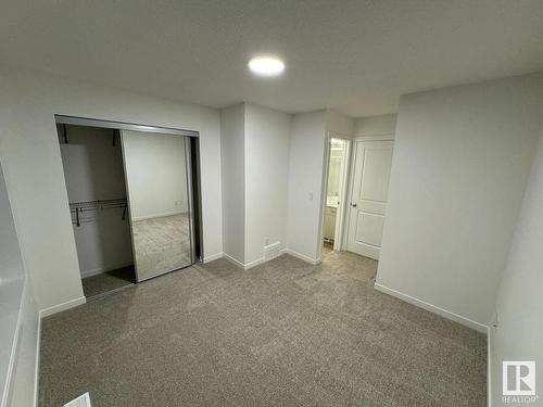 115 1025 Secord Promenade Nw, Edmonton, AB - Indoor Photo Showing Other Room