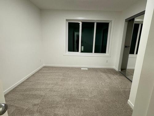 115 1025 Secord Promenade Nw, Edmonton, AB - Indoor Photo Showing Other Room