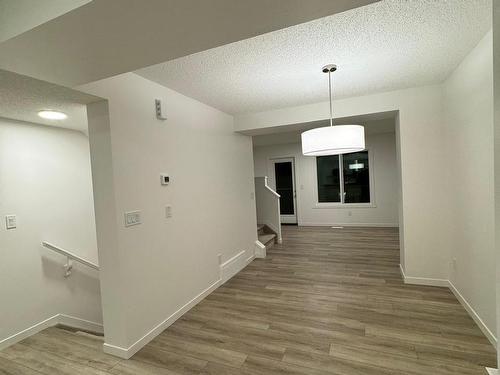 115 1025 Secord Promenade Nw, Edmonton, AB - Indoor Photo Showing Other Room