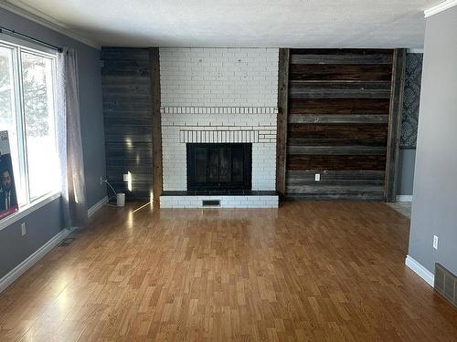 4511 41A Street, Bonnyville Town, AB - Indoor Photo Showing Living Room With Fireplace