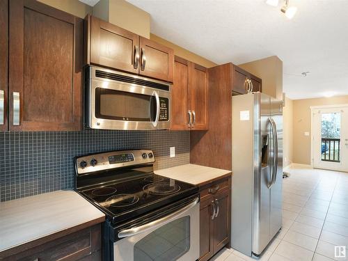 214 401 Southfork Drive, Leduc, AB - Indoor Photo Showing Kitchen