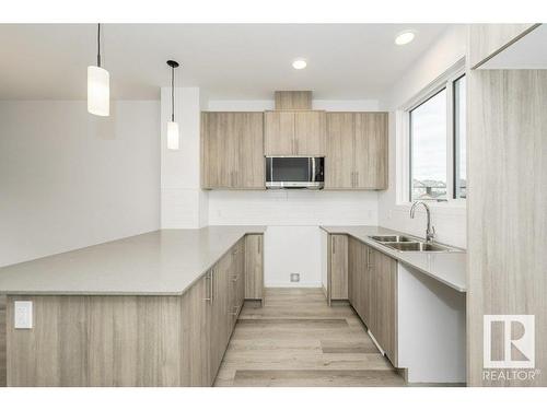 6324 176 Avenue, Edmonton, AB - Indoor Photo Showing Kitchen With Double Sink