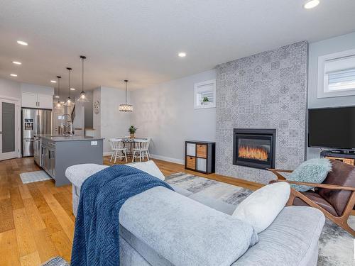 8534 81 Avenue, Edmonton, AB - Indoor Photo Showing Living Room With Fireplace