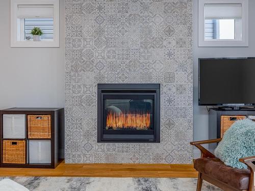 8534 81 Avenue, Edmonton, AB - Indoor Photo Showing Living Room With Fireplace