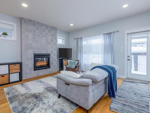 8534 81 Avenue, Edmonton, AB - Indoor Photo Showing Living Room With Fireplace