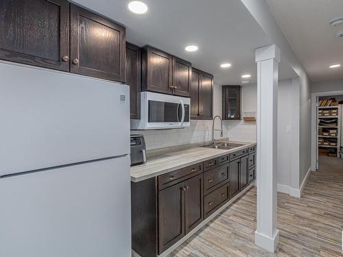 8534 81 Avenue, Edmonton, AB - Indoor Photo Showing Kitchen With Double Sink