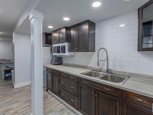 8534 81 Avenue, Edmonton, AB - Indoor Photo Showing Kitchen With Double Sink