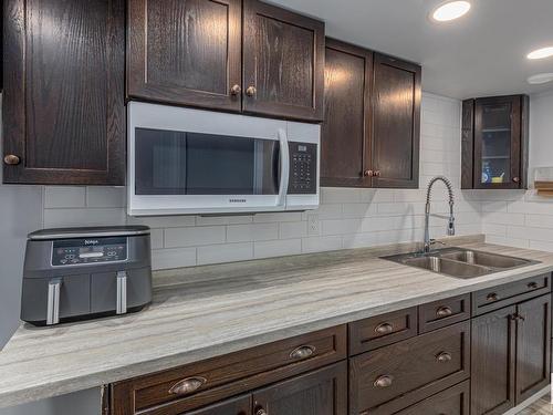 8534 81 Avenue, Edmonton, AB - Indoor Photo Showing Kitchen With Double Sink