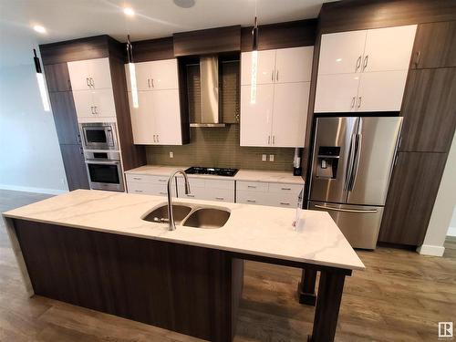 14032 106 Avenue, Edmonton, AB - Indoor Photo Showing Kitchen With Double Sink