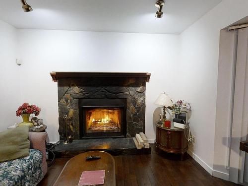 7116 187A Street, Edmonton, AB - Indoor Photo Showing Living Room With Fireplace