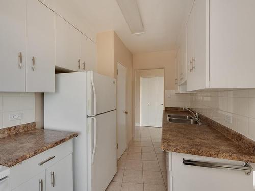 603 12207 Jasper Avenue, Edmonton, AB - Indoor Photo Showing Kitchen With Double Sink