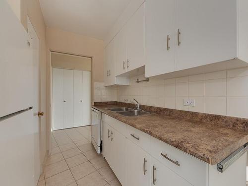 603 12207 Jasper Avenue, Edmonton, AB - Indoor Photo Showing Kitchen With Double Sink