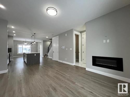 17708 59 Street, Edmonton, AB - Indoor Photo Showing Living Room With Fireplace