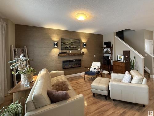 118 Gilmore Way, Spruce Grove, AB - Indoor Photo Showing Living Room With Fireplace