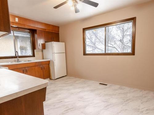 8704 122 Avenue, Edmonton, AB - Indoor Photo Showing Kitchen With Double Sink