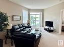 400 9940 Sherridon Drive, Fort Saskatchewan, AB  - Indoor Photo Showing Living Room 