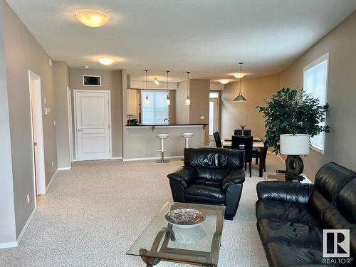 400 9940 Sherridon Drive, Fort Saskatchewan, AB - Indoor Photo Showing Living Room