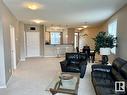 400 9940 Sherridon Drive, Fort Saskatchewan, AB  - Indoor Photo Showing Living Room 