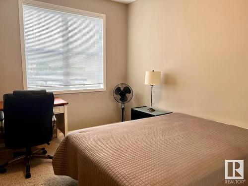 400 9940 Sherridon Drive, Fort Saskatchewan, AB - Indoor Photo Showing Bedroom