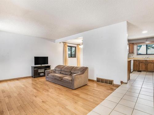 6327 12 Avenue, Edmonton, AB - Indoor Photo Showing Living Room