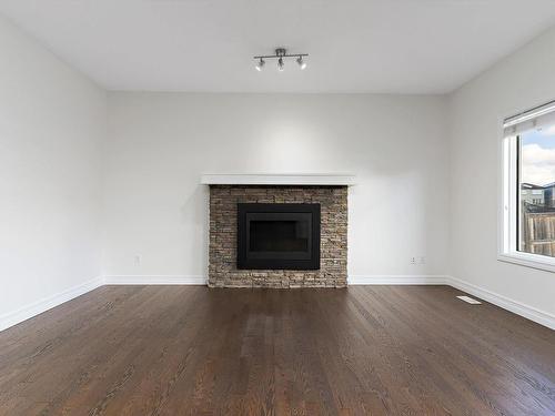 2805 16A Avenue, Edmonton, AB - Indoor Photo Showing Living Room With Fireplace