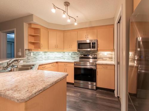 140 9704 174 Street, Edmonton, AB - Indoor Photo Showing Kitchen With Double Sink