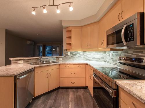 140 9704 174 Street, Edmonton, AB - Indoor Photo Showing Kitchen With Double Sink