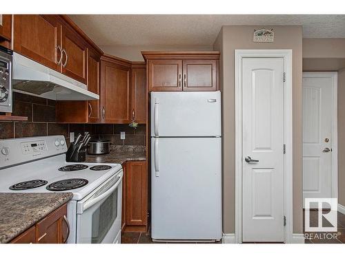 304 5204 52 Avenue, Tofield, AB - Indoor Photo Showing Kitchen