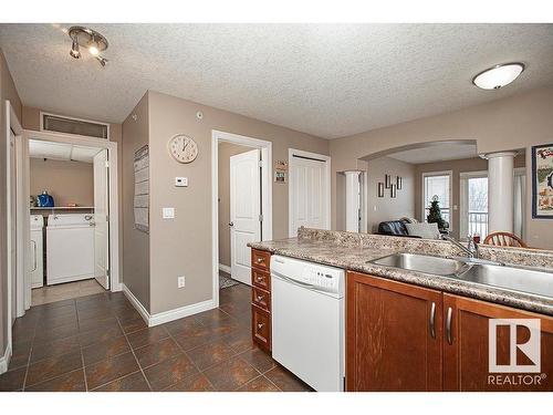 304 5204 52 Avenue, Tofield, AB - Indoor Photo Showing Kitchen With Double Sink